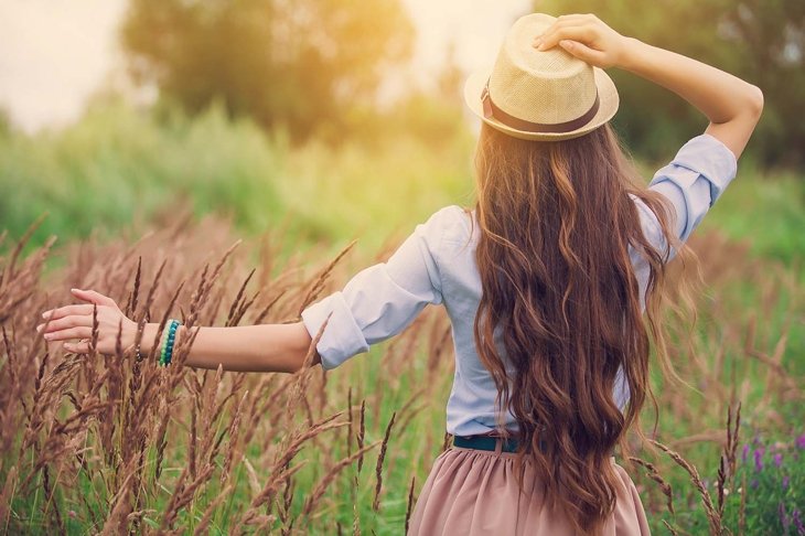 Beauty young girl outdoors enjoying nature