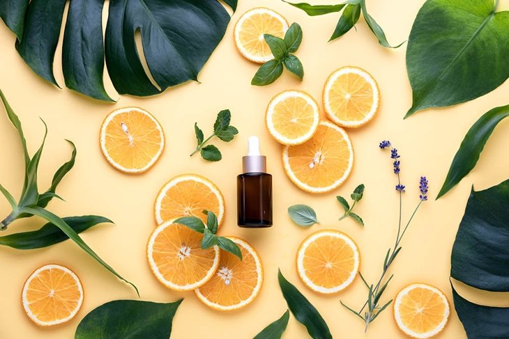 Natural cosmetics concept, fresh ingredients for skin treatment vitamin C serum, flat lay