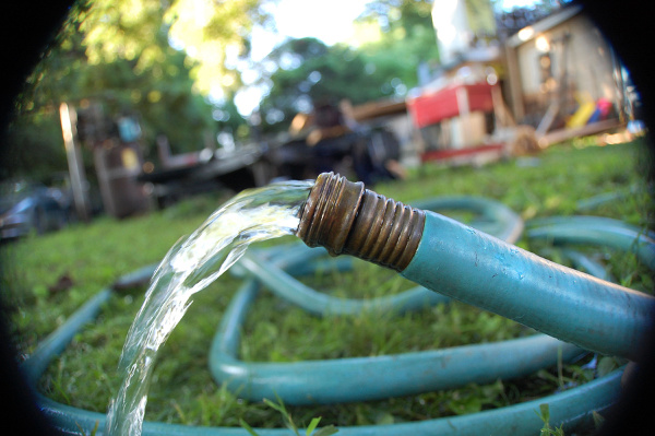 16 Summer Water Activities for Kids | If you’re looking for fun and creative ways to keep your kids cool and entertained outside this summer, these ideas are for you! From a DIY sprinkler and pool noodle waterfall, to outdoor games like water balloon pinatas and fill the bucket, these summer activities will be turning backyards into awesome summer retreats for kids everywhere on hot summer days! #wateractivities #summeractivities #outdooractivities #summerfun